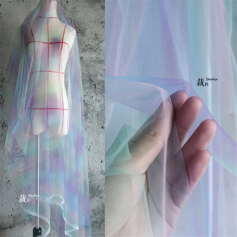45cm*150cm/piece Elastic gradient rainbow mesh perspective laser fantasy mesh clothing designer original fabrics
45cm*150cm/piece Elastic gradient rainbow mesh perspective laser fantasy mesh clothing designer original fabrics