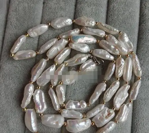 Beautiful REAL NATURAL 8X35MM WHITE SOUTH SEA BAROQUE KESHI AKOYA PEARL NECKLACE 36"
Beautiful REAL NATURAL 8X35MM WHITE SOUTH SEA BAROQUE KESHI AKOYA PEARL NECKLACE 36"