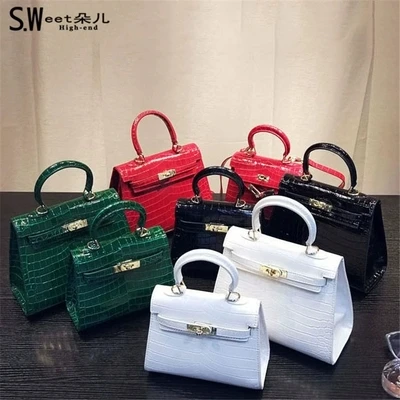Bags for women 2018 new crocodile pattern patent leather versatile shoulder slung mini portable platinum Kelly wedding bag
Bags for women 2018 new crocodile pattern patent leather versatile shoulder slung mini portable platinum Kelly wedding bag