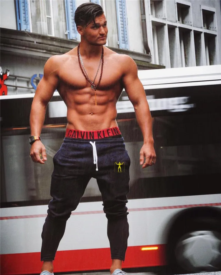 Mens Fitness Sweatpants Male Gym Bodybuilding Joggers Workout Cotton Boys Trousers Sport Clothing Sportswear Brand Running Pants
Mens Fitness Sweatpants Male Gym Bodybuilding Joggers Workout Cotton Boys Trousers Sport Clothing Sportswear Brand Running Pants