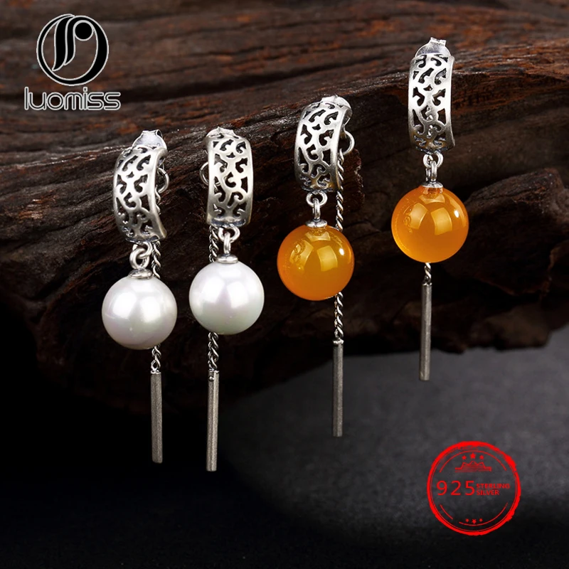 S925 pure silver antique decorative pattern inlaid with pearl and yellow medullary pendants
S925 pure silver antique decorative pattern inlaid with pearl and yellow medullary pendants