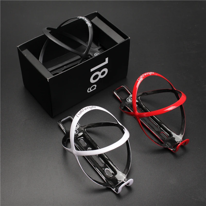 2017 (With box) Wholesale Pricelig edelhelfer ht weig ht to 18 g of carbon bicycle bottle cage Carbon bottle holder with water
2017 (With box) Wholesale Pricelig edelhelfer ht weig ht to 18 g of carbon bicycle bottle cage Carbon bottle holder with water