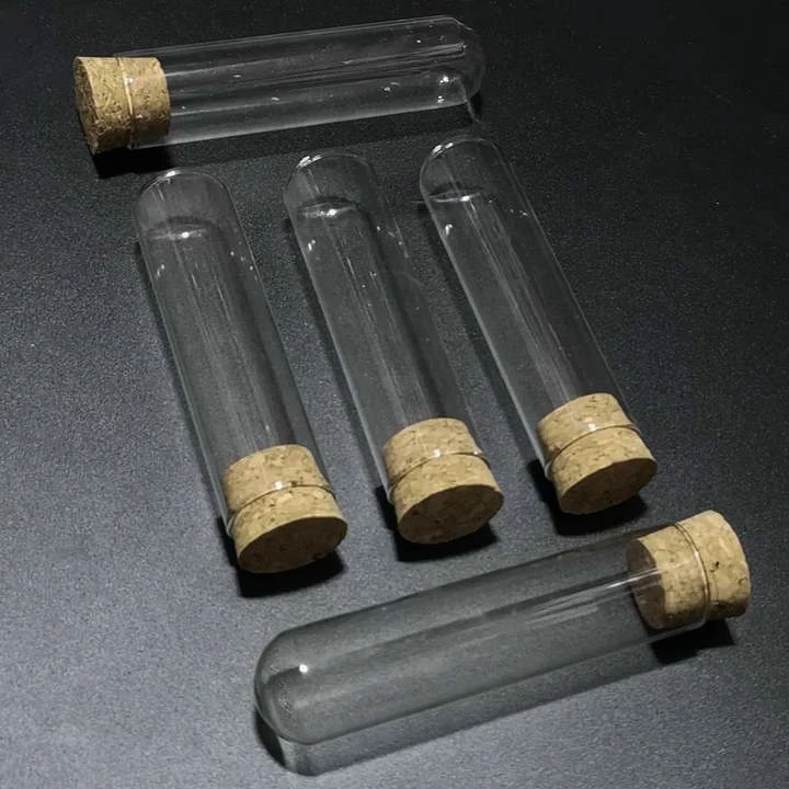 12pcs/lot 25x100mm Round bottom Glass test tube with cork stopper Cap for Lab Experiments
12pcs/lot 25x100mm Round bottom Glass test tube with cork stopper Cap for Lab Experiments