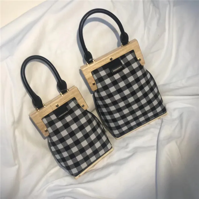 2018 Spring New Retro Fashion Plaid Mini Wooden Clip Bucket Bag Chain Shoulder Handbag Women Bag Canvas Day Clutches
2018 Spring New Retro Fashion Plaid Mini Wooden Clip Bucket Bag Chain Shoulder Handbag Women Bag Canvas Day Clutches