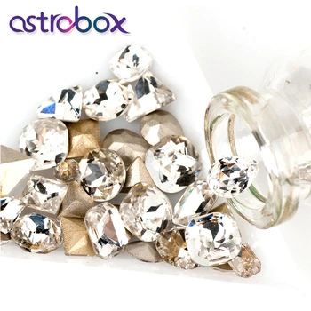 50Pcs Multi Shape Glass Nail Rhinestones Point Back Crystal Strass 3D Charm Gems DIY Manicure Nail Art Decorations Designs
50Pcs Multi Shape Glass Nail Rhinestones Point Back Crystal Strass 3D Charm Gems DIY Manicure Nail Art Decorations Designs
