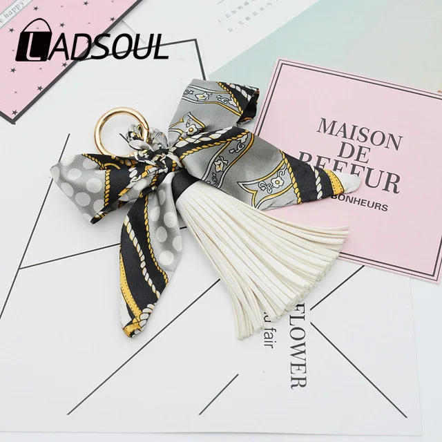 LADSOUL Fashion Hot Sale Scarves Key holder Bowknot Exquisite Decoration PU Leather Tassels Keychains Women Bag Charm Pendant
LADSOUL Fashion Hot Sale Scarves Key holder Bowknot Exquisite Decoration PU Leather Tassels Keychains Women Bag Charm Pendant