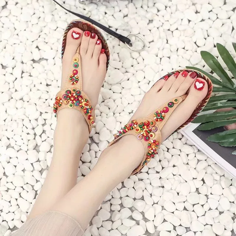 Sandals female 2019 summer explosion models bohemian sweet agate handmade beaded herringbone flat bottom beach shoes.
Sandals female 2019 summer explosion models bohemian sweet agate handmade beaded herringbone flat bottom beach shoes.