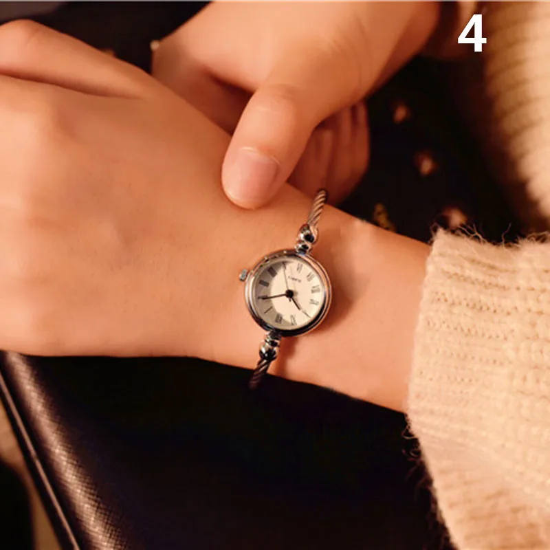1 Pcs Women Lady Girl Student Wrist Quartz Watch Mini Round Alloy Vintage Gift GDD99
1 Pcs Women Lady Girl Student Wrist Quartz Watch Mini Round Alloy Vintage Gift GDD99