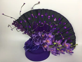 Purple flower vine Chinese wind fan headdress Stage shows studio creative photo hair shape
Purple flower vine Chinese wind fan headdress Stage shows studio creative photo hair shape