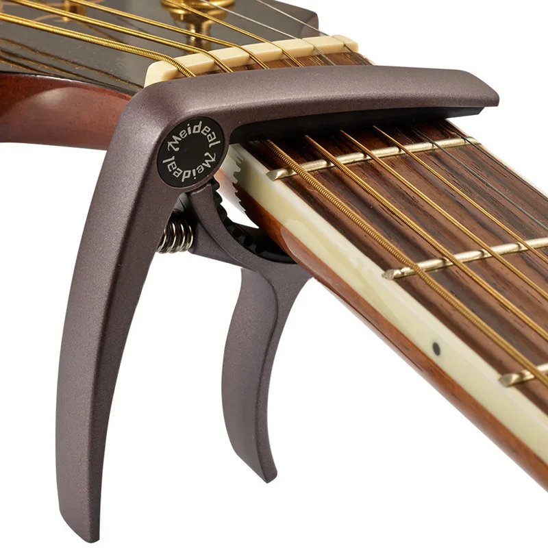 High Quality Guitar Tune Key Trigger Capo Clamp Quick Change Trigger Capo Key Clamp for Ukulele Color Coffee SS
High Quality Guitar Tune Key Trigger Capo Clamp Quick Change Trigger Capo Key Clamp for Ukulele Color Coffee SS