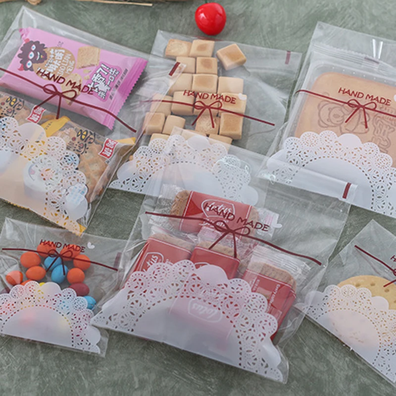 Hot 100Pcs 7x7/10x10cm Cute Lace Bow Print Self-adhesive Gifts Bags Wedding Party Cellophane Bag Plastic Biscuit Party Favor Bag
Hot 100Pcs 7x7/10x10cm Cute Lace Bow Print Self-adhesive Gifts Bags Wedding Party Cellophane Bag Plastic Biscuit Party Favor Bag