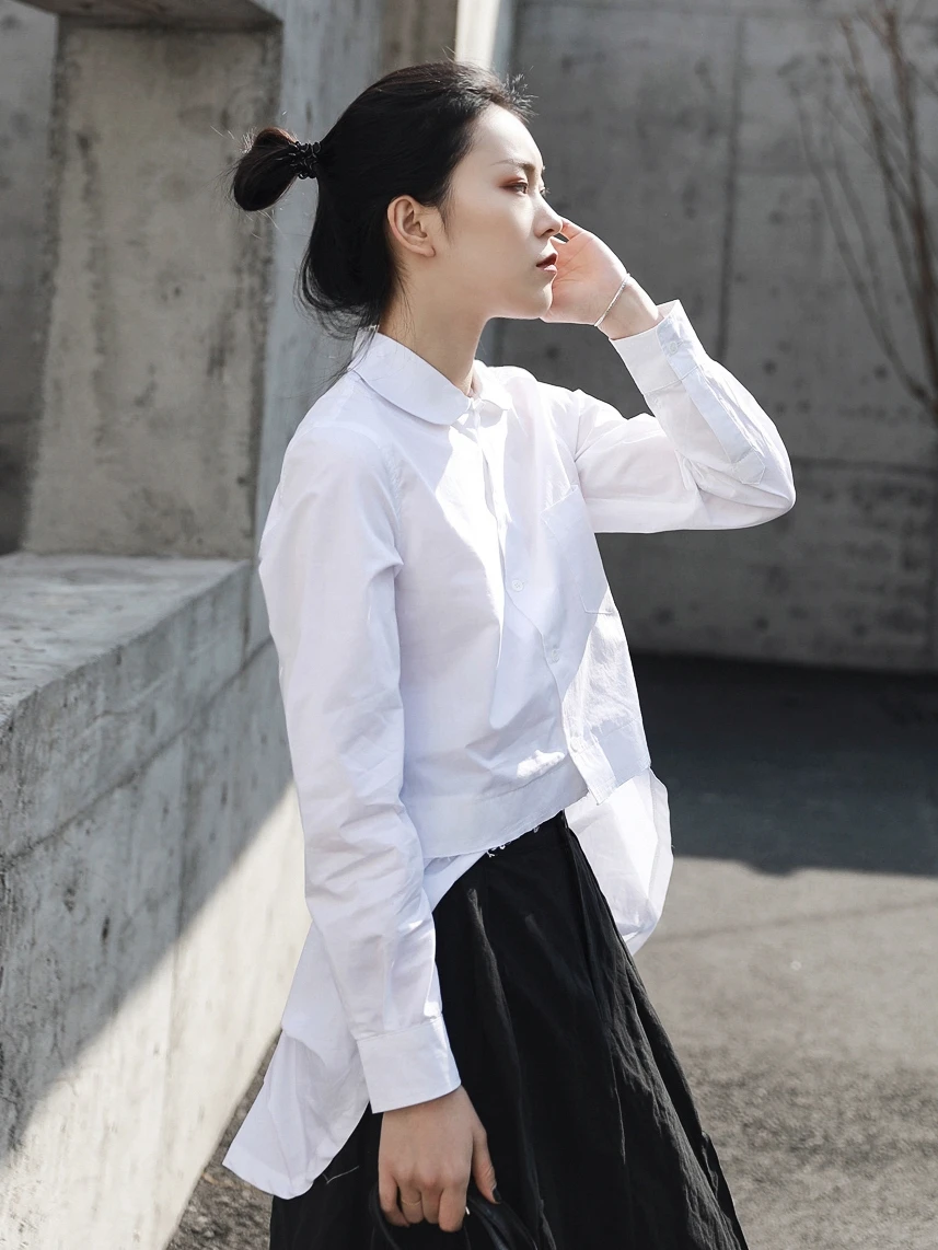 Cakucool 2019 spring new Japanese designer front short long doll collar personality long sleeve white shirt
Cakucool 2019 spring new Japanese designer front short long doll collar personality long sleeve white shirt