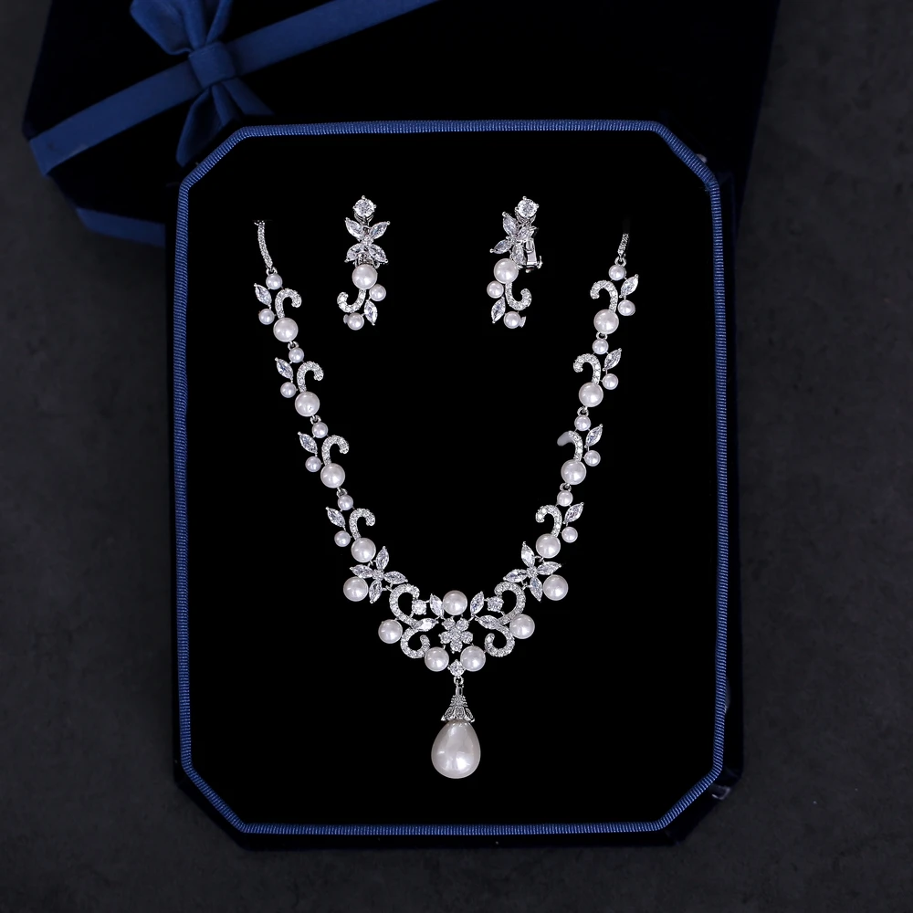 Fashion Wedding Bridal Jewelry Sets Simulated Pearls Pendant Necklace AAA Cubic Zirconia Flower Drop Earrings Women Bijoux Gifts
Fashion Wedding Bridal Jewelry Sets Simulated Pearls Pendant Necklace AAA Cubic Zirconia Flower Drop Earrings Women Bijoux Gifts