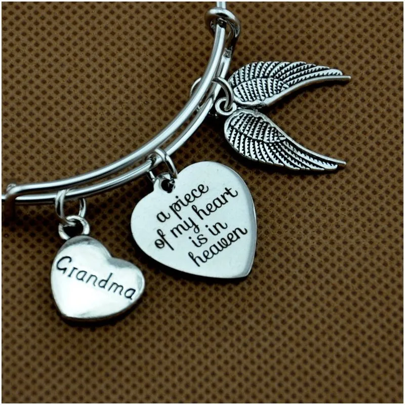 

Angel Wing bracelet,Memorial bangle, A piece of my heart is in Heaven Sympathy Gift Loss of Mom/Daughter/ Grandpa /Dad/ Son/ Bro