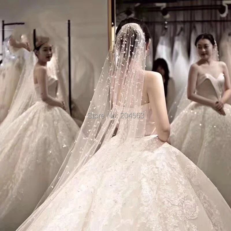 Unique Design Wedding Veil with Pearls Bridal Veils for Bride with Comb Wedding Accessories
Unique Design Wedding Veil with Pearls Bridal Veils for Bride with Comb Wedding Accessories