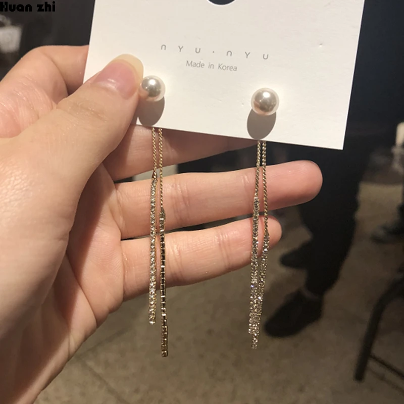 HUANZHI Korean S925 Sterling Silver Metal Gold Pearl Crystal Rhinestone Long Tassel Double Chain Drop Earrings for Women Girl
HUANZHI Korean S925 Sterling Silver Metal Gold Pearl Crystal Rhinestone Long Tassel Double Chain Drop Earrings for Women Girl