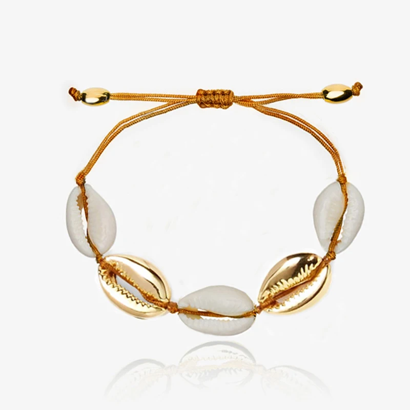 New arrival natural Puka in the form of a shell gold bracelet in the form of the Cowrie shell Bracelets boho fashionable beach
New arrival natural Puka in the form of a shell gold bracelet in the form of the Cowrie shell Bracelets boho fashionable beach