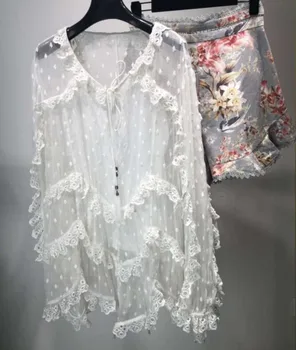 White Silk Blouse Embroidered V-neck with ties Ruffled detail Long Puff SLeeved tops woman Asymmetric hem
White Silk Blouse Embroidered V-neck with ties Ruffled detail Long Puff SLeeved tops woman Asymmetric hem