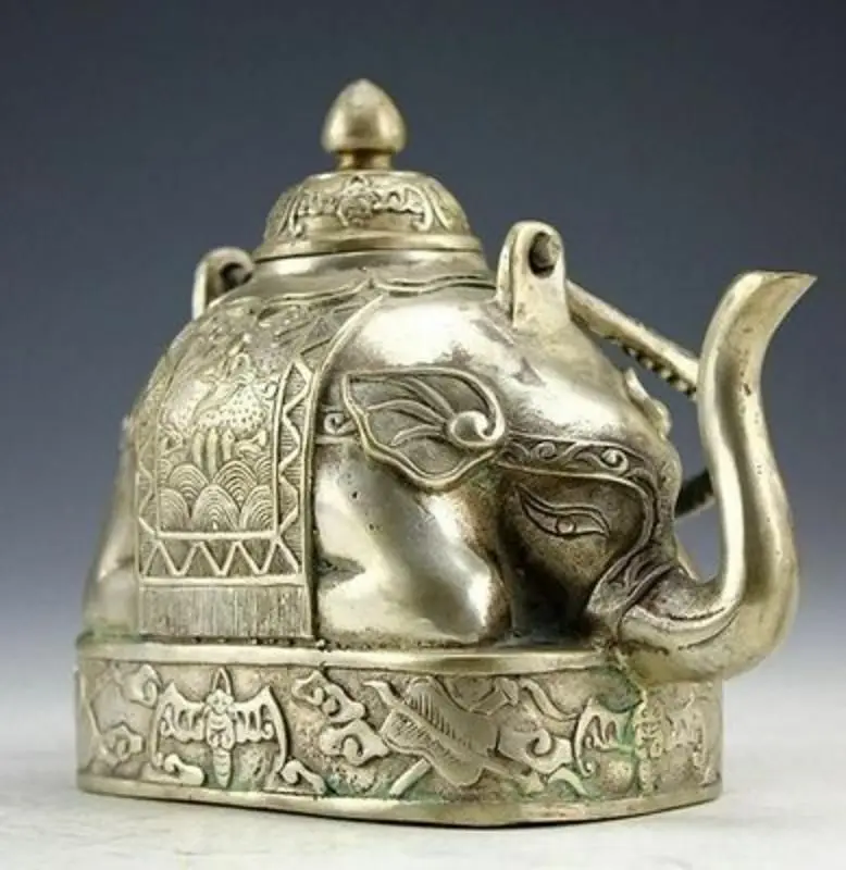 Chinese Rare Miao Silver Carving Animal Wealth Elephant Shape Tea Pot Kungfu Tea Set Teapot Water Pot
Chinese Rare Miao Silver Carving Animal Wealth Elephant Shape Tea Pot Kungfu Tea Set Teapot Water Pot