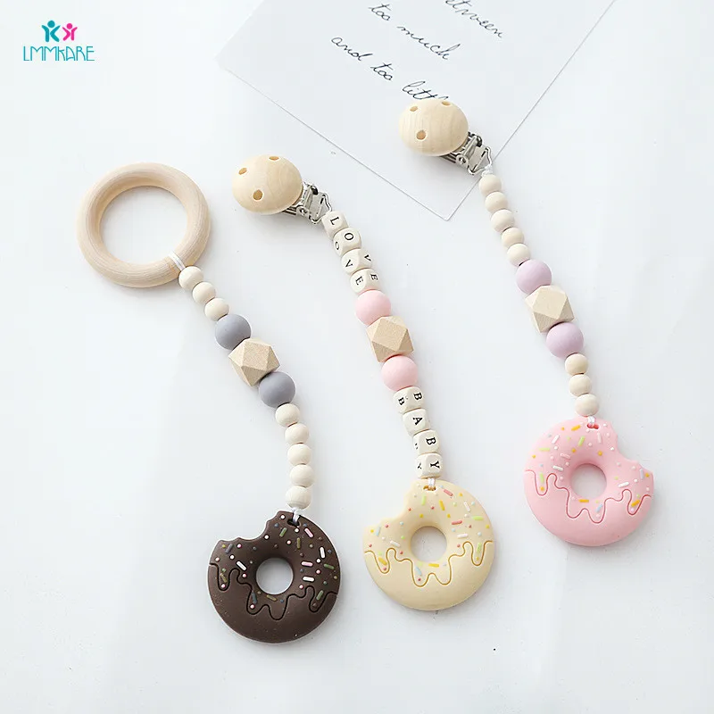 Baby Wooden Pacifier Clip Cartoon Cute Children's Silicone Pacifier Clamps Beads Babies Chew Toy Soother Chains Baby Care
Baby Wooden Pacifier Clip Cartoon Cute Children's Silicone Pacifier Clamps Beads Babies Chew Toy Soother Chains Baby Care