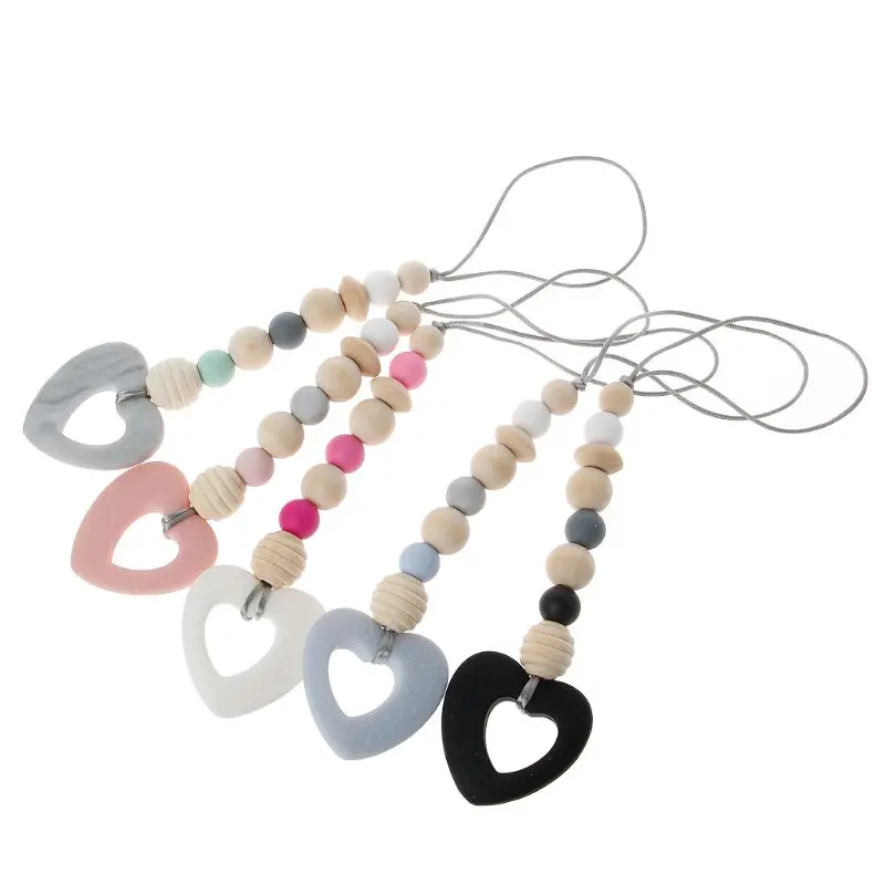 New Teether Safe Silicone Wood Play Gym Toy Babe Hanger Toys Toddler Teething Rattle Nursery Toy Newborn Gift Baby Chew Toys
New Teether Safe Silicone Wood Play Gym Toy Babe Hanger Toys Toddler Teething Rattle Nursery Toy Newborn Gift Baby Chew Toys