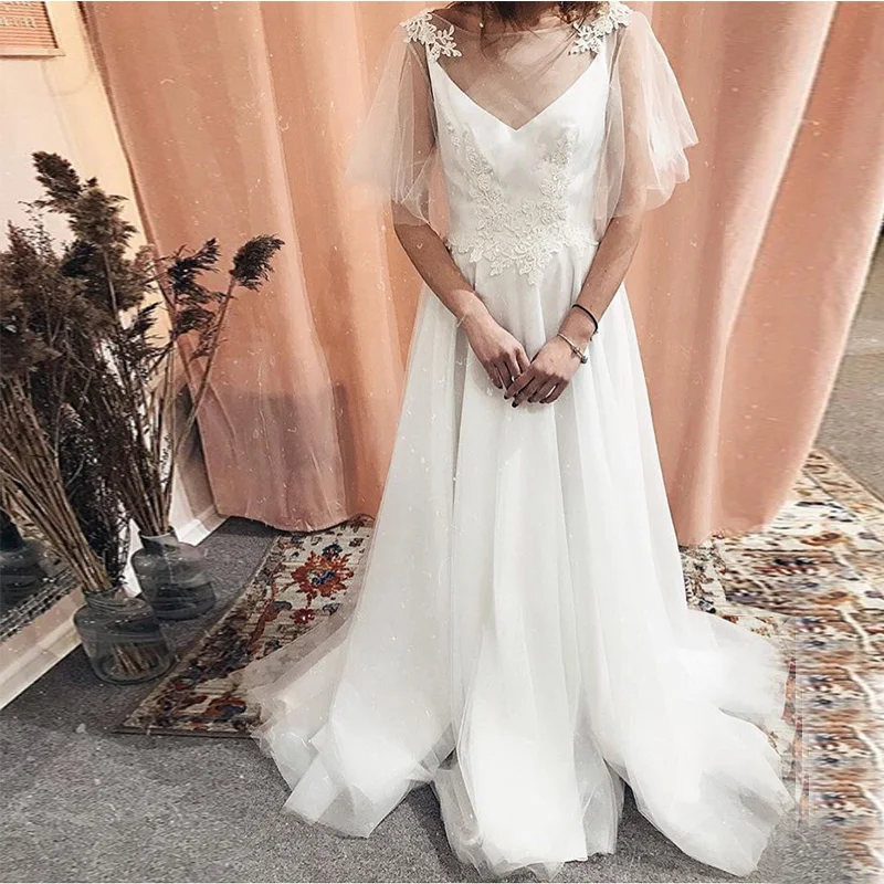 DZ655 A-line Boho Wedding Dresses Short Sleeves Lace Beach Bridal Gowns Tulle Skirt Backless Sweep Tain Vestidos De Noiva
DZ655 A-line Boho Wedding Dresses Short Sleeves Lace Beach Bridal Gowns Tulle Skirt Backless Sweep Tain Vestidos De Noiva