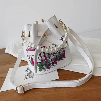 Summer small fresh bucket bag female new letters cartoon graffiti printing shoulder bag foreign pearls portable messenger bag
Summer small fresh bucket bag female new letters cartoon graffiti printing shoulder bag foreign pearls portable messenger bag