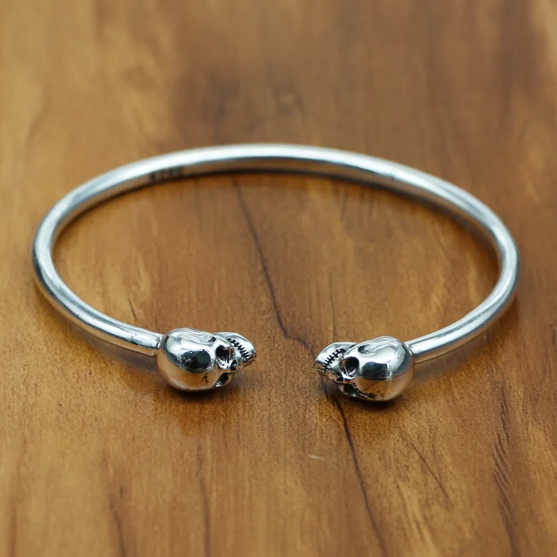 Manufacturers Wholesale S925 Sterling Silver Retro Thai Silver Punk Double Skull Open Ended Men And Women Models Bangle
Manufacturers Wholesale S925 Sterling Silver Retro Thai Silver Punk Double Skull Open Ended Men And Women Models Bangle