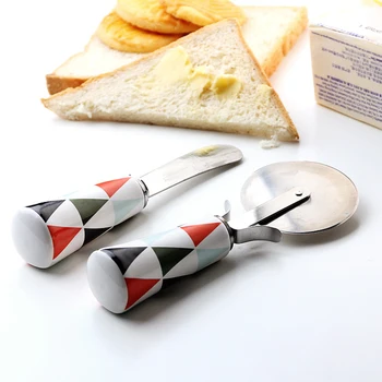 2Pcs Cybil Stainless Steel Butter Cake Cream Knife Spatula and Pizza Cutter Round Wheel with Ceramic Handle Kitchen Tool
2Pcs Cybil Stainless Steel Butter Cake Cream Knife Spatula and Pizza Cutter Round Wheel with Ceramic Handle Kitchen Tool