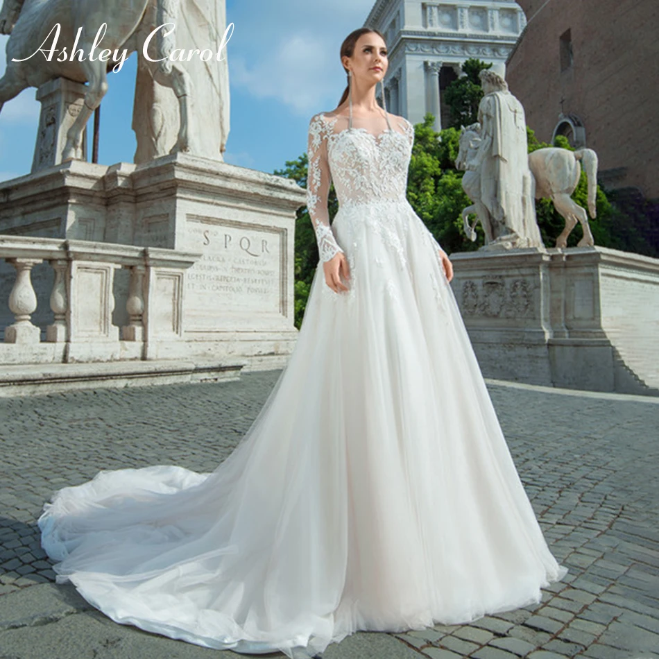 Ashley Carol Sexy Scoop Long Sleeve Appliques Illusion Wedding Dress 2019 New Romantic Court Train Elegant Simple Wedding Gowns
Ashley Carol Sexy Scoop Long Sleeve Appliques Illusion Wedding Dress 2019 New Romantic Court Train Elegant Simple Wedding Gowns