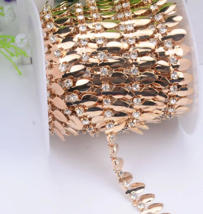 1yard/lot gold Leaf shape rhinestone chain metal trim for bridal costume ornament 1.5cm width necklace Collar chain
1yard/lot gold Leaf shape rhinestone chain metal trim for bridal costume ornament 1.5cm width necklace Collar chain