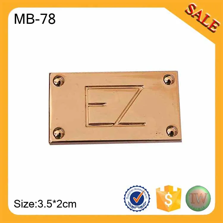 MB78 Customized gold letter logo design stick on metal labels for clothing/swimwear/bag
MB78 Customized gold letter logo design stick on metal labels for clothing/swimwear/bag