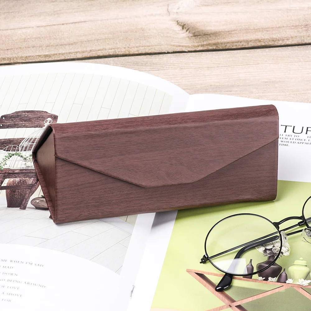 5 Colors New Unisex Folding Leather Glasses Case Box Portable Triangular Glasses Container Eyeglass Sunglasses Eyewear Protector
5 Colors New Unisex Folding Leather Glasses Case Box Portable Triangular Glasses Container Eyeglass Sunglasses Eyewear Protector