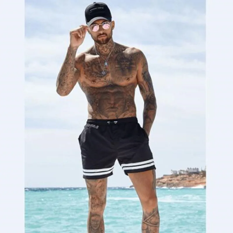 2019 New Mens Sexy Swimsuit Swimwear Men Swimming Shorts Men Briefs Beach Shorts Sports Suits Surf Board Shorts Men Swim Trunks
2019 New Mens Sexy Swimsuit Swimwear Men Swimming Shorts Men Briefs Beach Shorts Sports Suits Surf Board Shorts Men Swim Trunks
