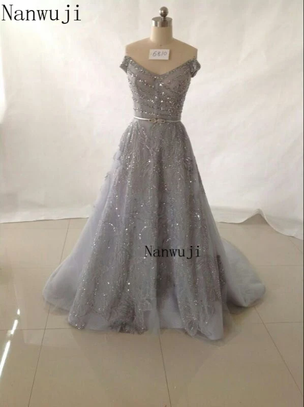 vestido de festa Boat neck Long Grey Evening dress with Cap Sleeve Backless Beadings And Crystals long Prom Dress
vestido de festa Boat neck Long Grey Evening dress with Cap Sleeve Backless Beadings And Crystals long Prom Dress