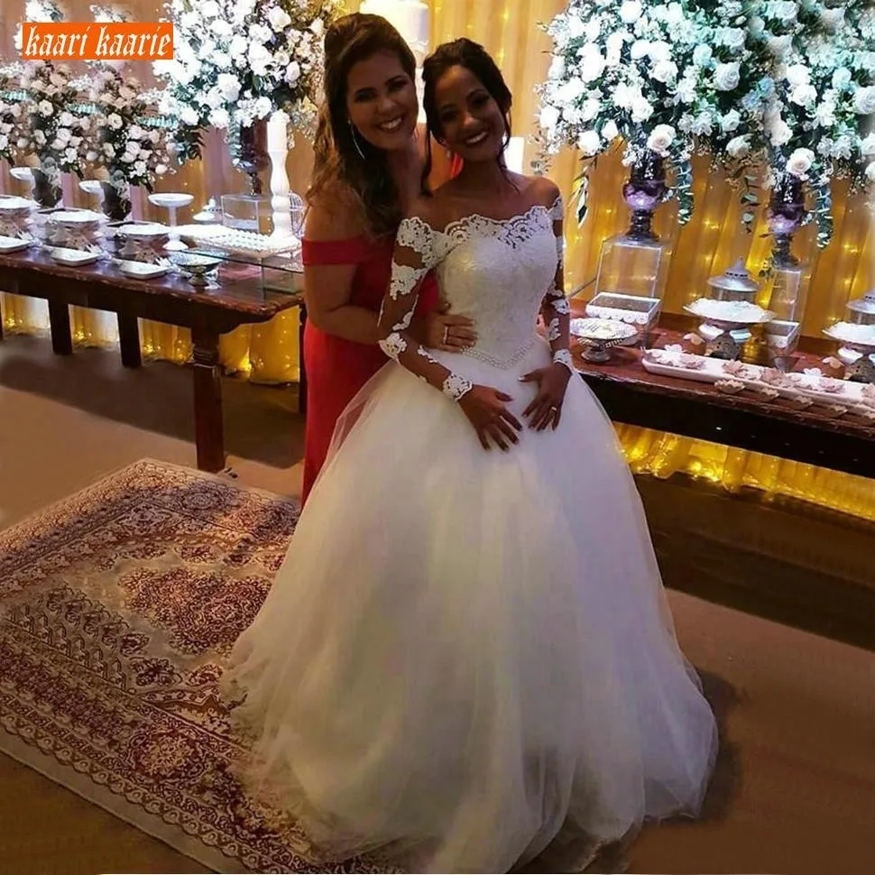 Elegant White Tulle A Line Wedding Dress Long Sleeve Boat Neck Lace Appliques Ivory Wedding Gown Princess Pageant Bride Dress
Elegant White Tulle A Line Wedding Dress Long Sleeve Boat Neck Lace Appliques Ivory Wedding Gown Princess Pageant Bride Dress