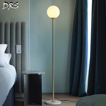 Post-modern Glass Ball Vertical Floor Lamp Ins Minimalist Living Room Floor Lights Creative Personality Nordic Modern Floor Lamp
Post-modern Glass Ball Vertical Floor Lamp Ins Minimalist Living Room Floor Lights Creative Personality Nordic Modern Floor Lamp