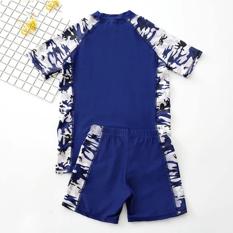 summer new boy swimwear camouflage printing kids boy swimsuit beach board boy swim shirt trunk bikinis set suit bathing suit
summer new boy swimwear camouflage printing kids boy swimsuit beach board boy swim shirt trunk bikinis set suit bathing suit