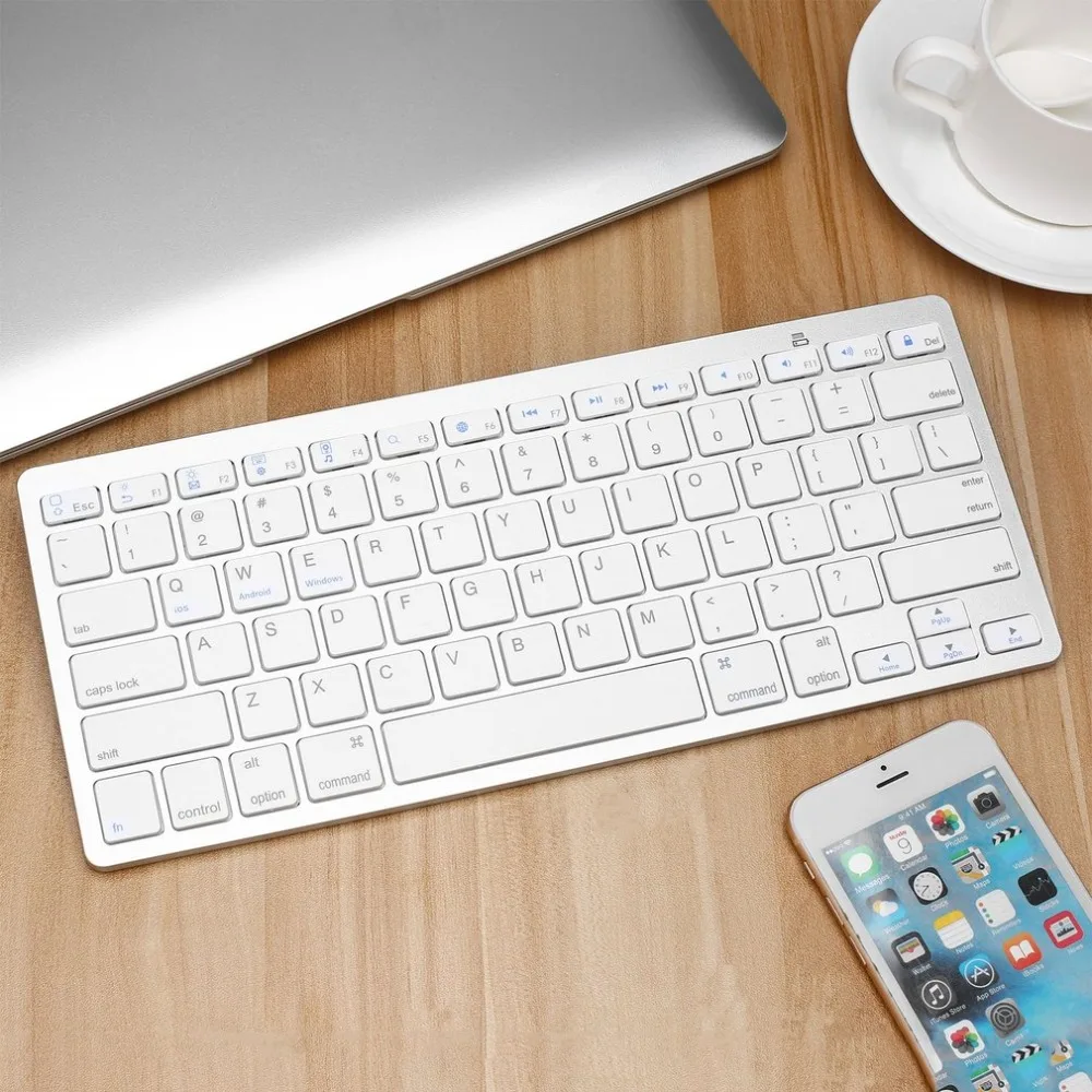 Silver Ultra-slim 78 Keys Wireless Bluetooth Keyboard For Air for ipad Mini for Mac Computer PC
Silver Ultra-slim 78 Keys Wireless Bluetooth Keyboard For Air for ipad Mini for Mac Computer PC