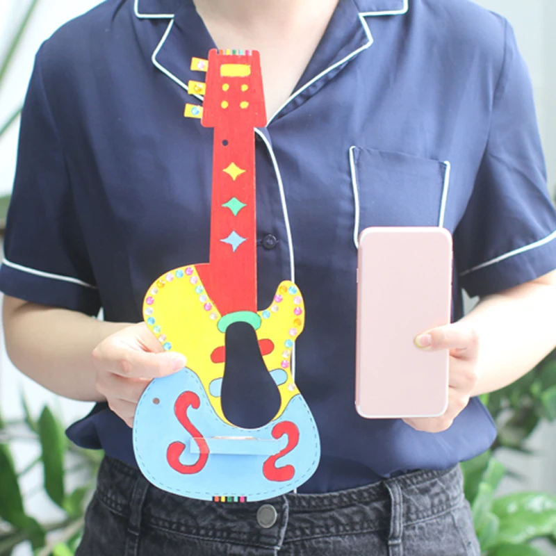 Creative Graffiti Wooden Guitar Material Package Children Birthday Party Holiday Decorations Collage Handmade Crafts DIY Toys
Creative Graffiti Wooden Guitar Material Package Children Birthday Party Holiday Decorations Collage Handmade Crafts DIY Toys