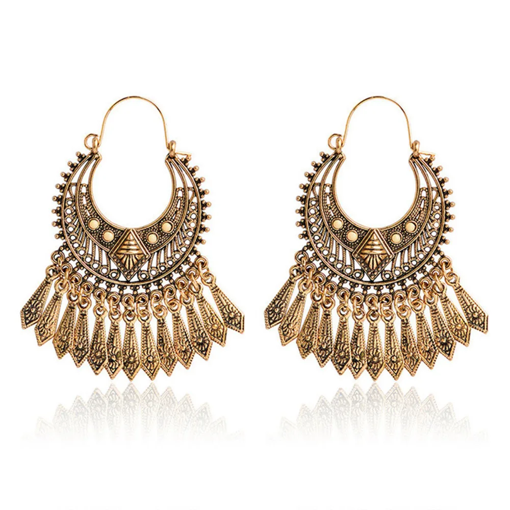 Bohemian ethnic vintage cutout metal tassel pendant earrings fashion exquisite personality design women's earrings chic jewelry
Bohemian ethnic vintage cutout metal tassel pendant earrings fashion exquisite personality design women's earrings chic jewelry