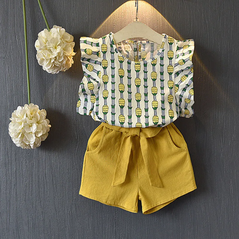 Kids clothing set summer pineapple print butterfly sleeve shirt +fashion pocket shorts kids clothing girls 2 piece set
Kids clothing set summer pineapple print butterfly sleeve shirt +fashion pocket shorts kids clothing girls 2 piece set