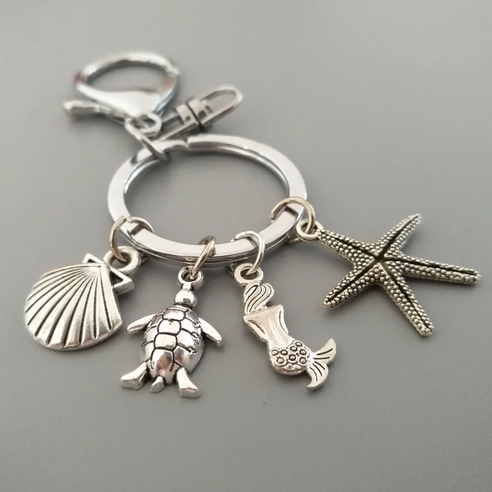 Sea world Keyring Alloy Accessory Keychain starfish Keyfob sea turtle mermaid scallop Keysholder Keydangle
Sea world Keyring Alloy Accessory Keychain starfish Keyfob sea turtle mermaid scallop Keysholder Keydangle