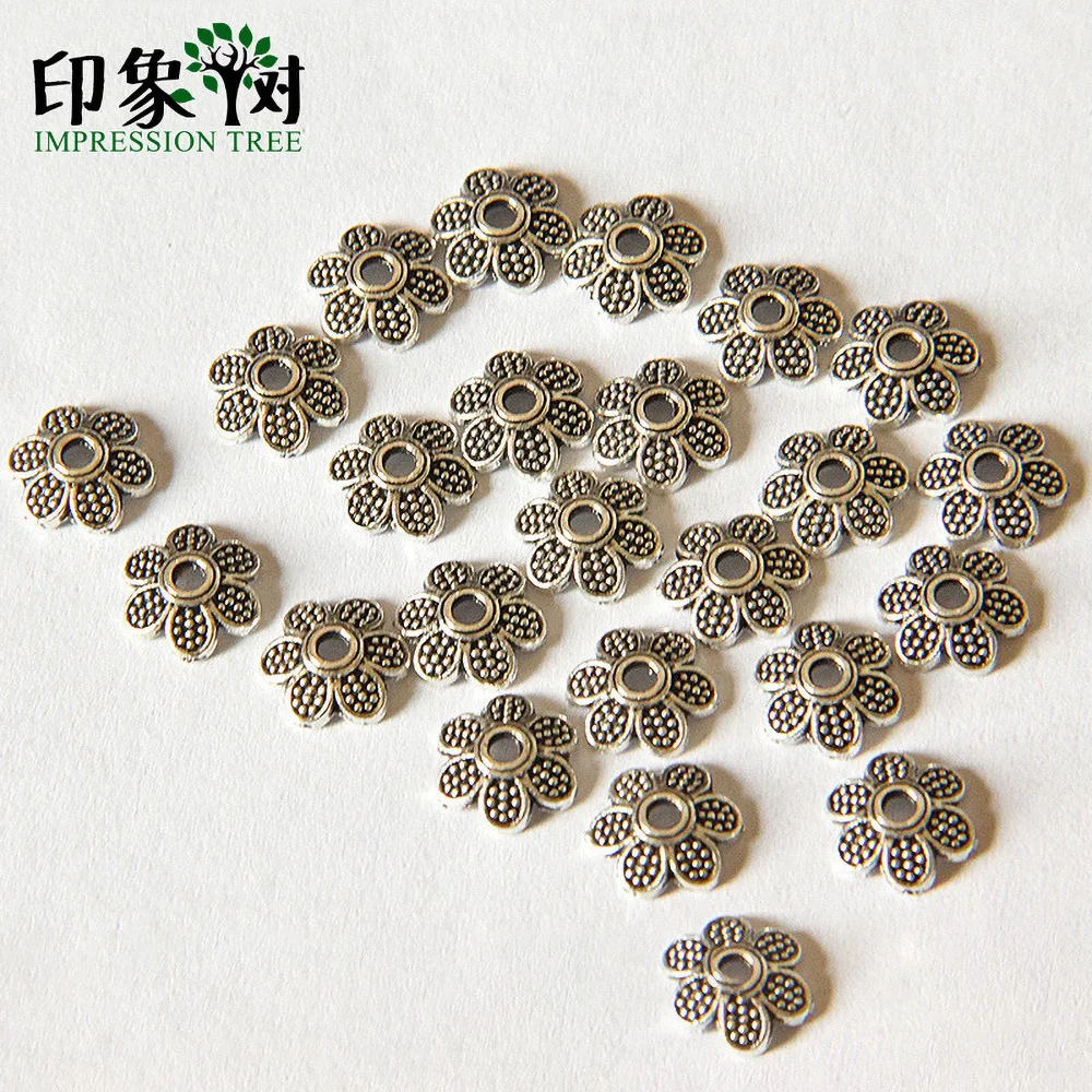 100pcs/lot 7mm Tibetan silver style Five-petal flower Engraving Torus Accessories for DIY jewelry making wholesale 2129
100pcs/lot 7mm Tibetan silver style Five-petal flower Engraving Torus Accessories for DIY jewelry making wholesale 2129