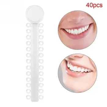New 40pcs/bag Dental Orthodontic Ligature Rubber Bands Teeth Corrector Elastic Brace
New 40pcs/bag Dental Orthodontic Ligature Rubber Bands Teeth Corrector Elastic Brace