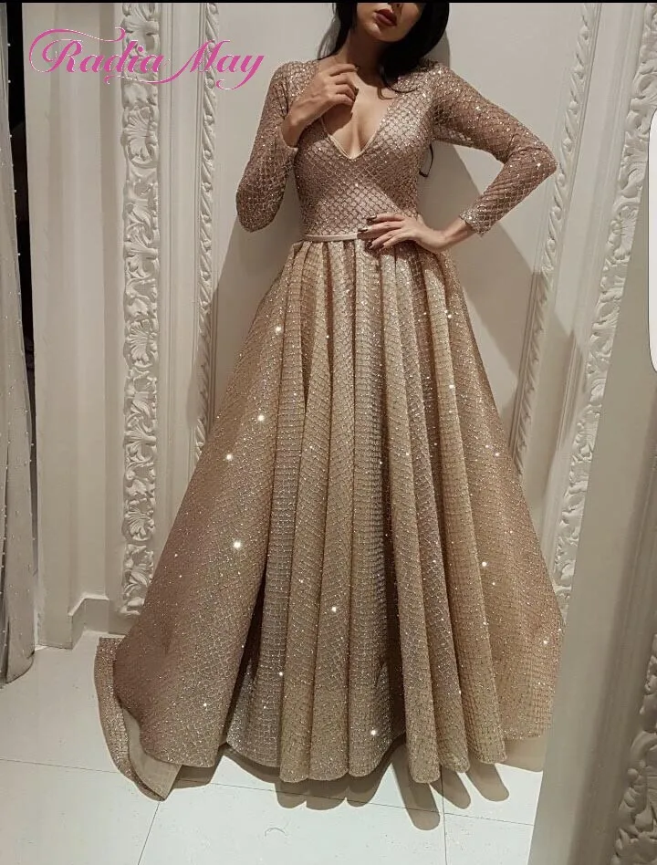 Glitter Rose Gold Sequins Arabic Evening Dress Long Sleeves V-Neck Muslim Abaya Kaftan Dubai Formal Prom Dresses 2019 Elegant
Glitter Rose Gold Sequins Arabic Evening Dress Long Sleeves V-Neck Muslim Abaya Kaftan Dubai Formal Prom Dresses 2019 Elegant