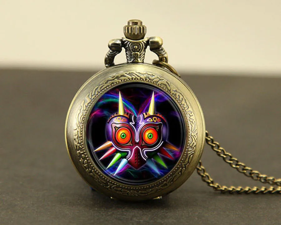 Legend of Zelda Game Majoras Mask Colorful owl Watch Necklace 1pcs/lot pocket watch Pendant Quartz jewelry Watches chain Gift
Legend of Zelda Game Majoras Mask Colorful owl Watch Necklace 1pcs/lot pocket watch Pendant Quartz jewelry Watches chain Gift