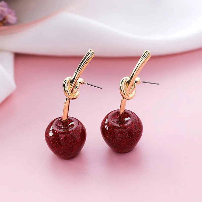 Dominated 2019 New Simple Sweet Metal Knotted Women Drop earrings Personality joker Resin cherry long earrings
Dominated 2019 New Simple Sweet Metal Knotted Women Drop earrings Personality joker Resin cherry long earrings