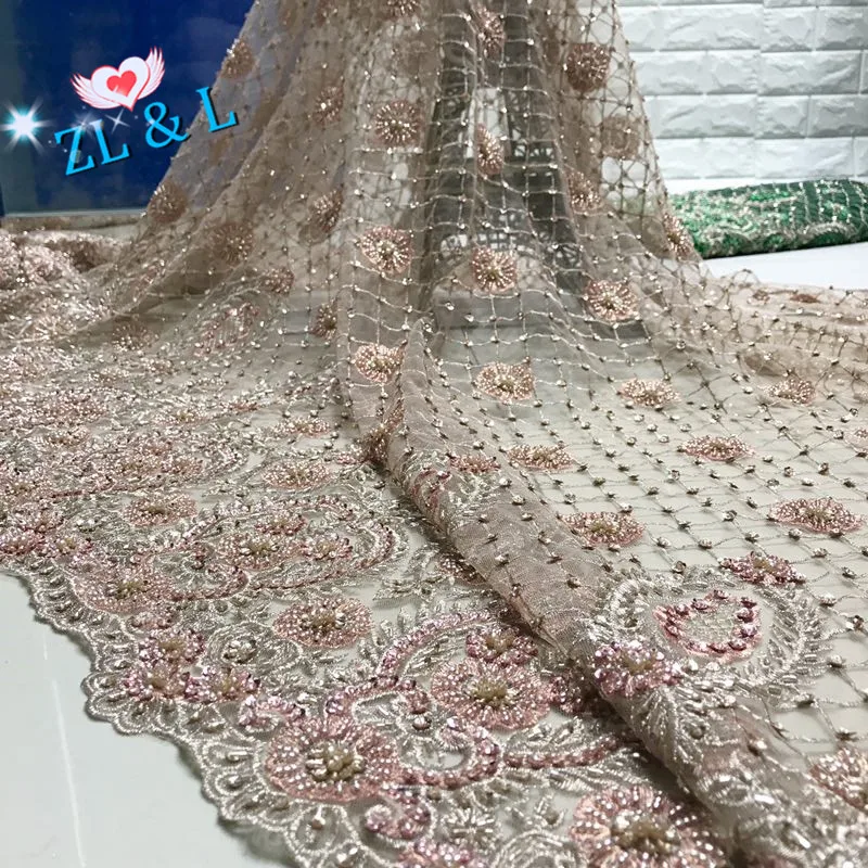 High-end hand-embroidered decorative beads sequins Africa Nigeria lace French tulle wedding dress skirt 5 yards new bestseller
High-end hand-embroidered decorative beads sequins Africa Nigeria lace French tulle wedding dress skirt 5 yards new bestseller