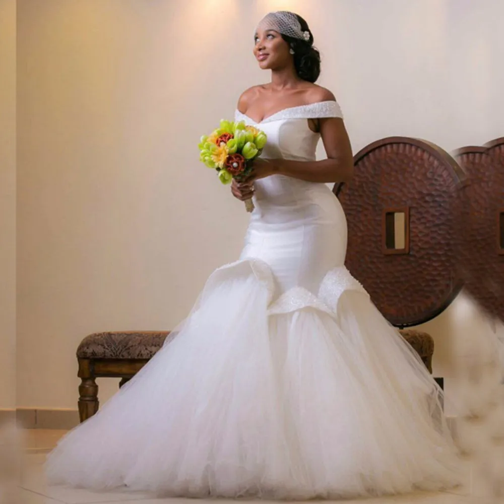 2019 New African Off Shoulder Mermaid Wedding Dress Elegant Beading Tassel Bridal Gown Wedding Gowns
2019 New African Off Shoulder Mermaid Wedding Dress Elegant Beading Tassel Bridal Gown Wedding Gowns